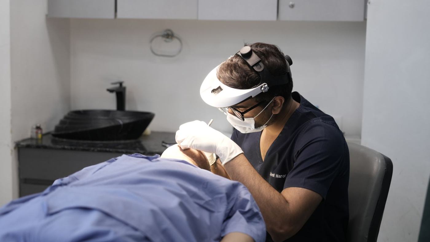 Clinician performing a skin procedure